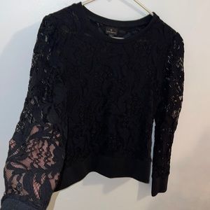Long sleeve lace tee shirt.